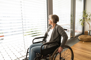 elderly woman in wheelchair