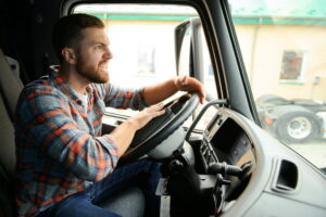 angry male truck driver honking his horn