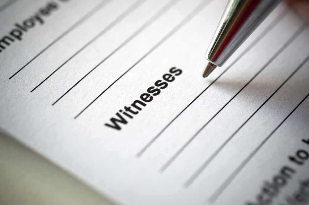 Pen and paper signaling the title "witnesses"