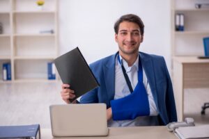 Young male employee happy after accident