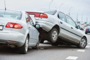 damaged cars after collision