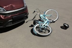 bicycle lying on the street after accident