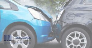 Two drivers exchanging insurance information after a minor car accident in South Carolina